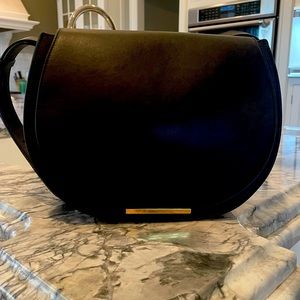 CUYANA | NBW Saddle Bag Black Leather , gold toned hardware, snap closure